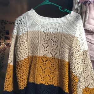 Cute multicolored slightly see through sweater!